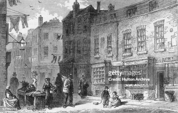 The Rookery, a notorious slum in St Giles, London, circa 1875. Parts of the area were already being cleared for the building of New Oxford Street but...