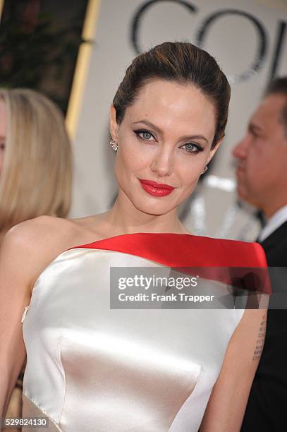 Actress Angelina Jolie arrives at the 69th Annual Golden Globe Awards held at the Beverly Hilton Hotel.