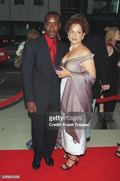 Don Cheadle and his wife arrive at the Samuel Goldwyn Theater.