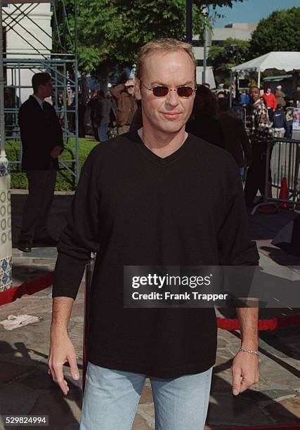 Michael Keaton, one of the stars of the movie, arrives.