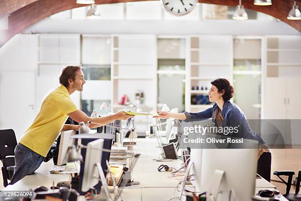 Handing Over File Woman Handing Folder Photos and Premium High Res Pictures - Getty Images