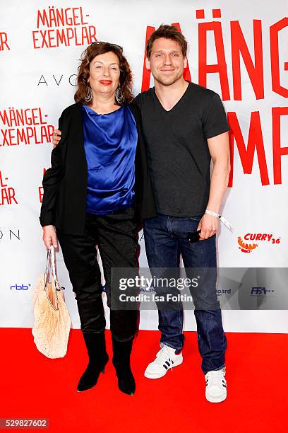 Actor Hanno Koffler and guest attend the German premiere of the film 'Maengelexemplar' at Cinestar Kulturbrauerei on May 9, 2016 in Berlin, Germany.