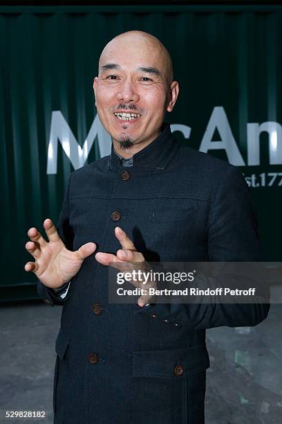 Artist Yang Jiechang attends the 'Empires' exhibition of Huang Yong Ping as part of Monumenta 2016 - Opening at Le Grand Palais on May 9, 2016 in...