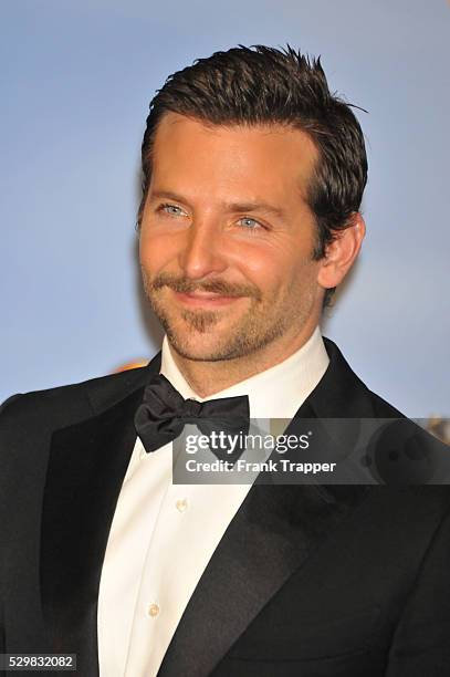 Actor Bradley Cooper poses in the press room at the 69th Annual Golden Globe Awards held at the Beverly Hilton Hotel.