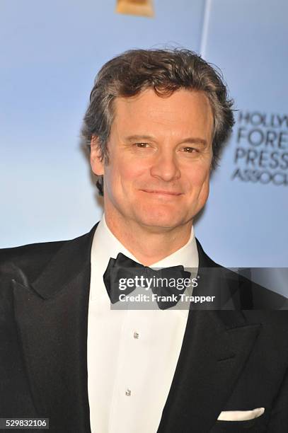 Actor Colin Firth poses in the press room at the 69th Annual Golden Globe Awards held at the Beverly Hilton Hotel.