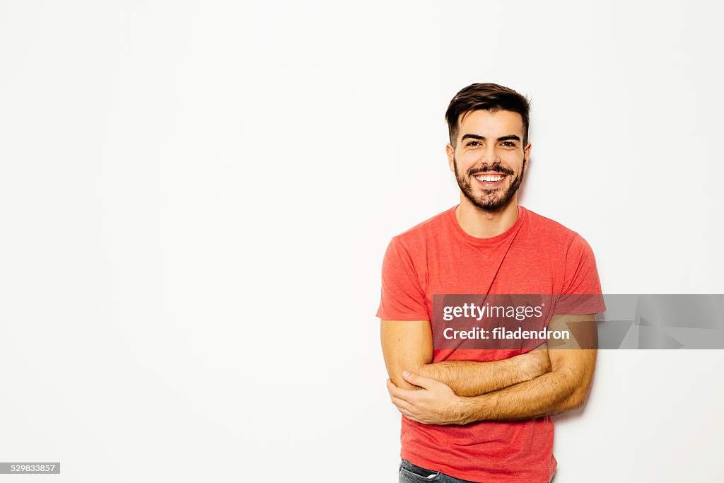 Young man in front of  white background