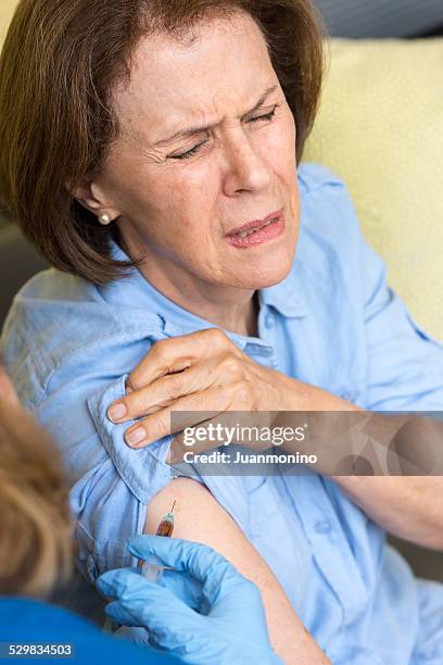 home healthcare - old lady crying out for help stock pictures, royalty-free photos & images