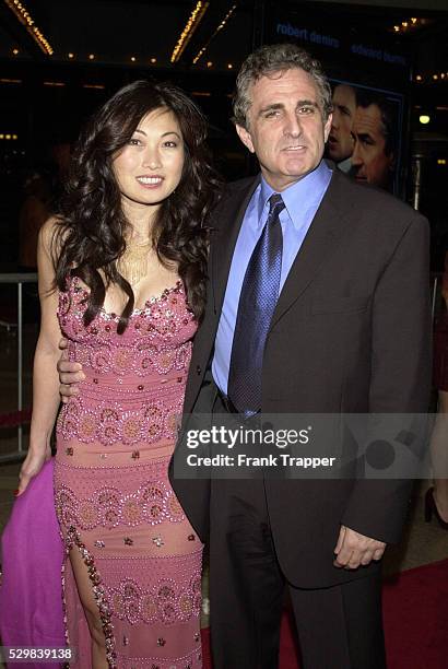 John Herzfeld and his wife Chris arrive at the Loews Cineplex Century Plaza Theater.