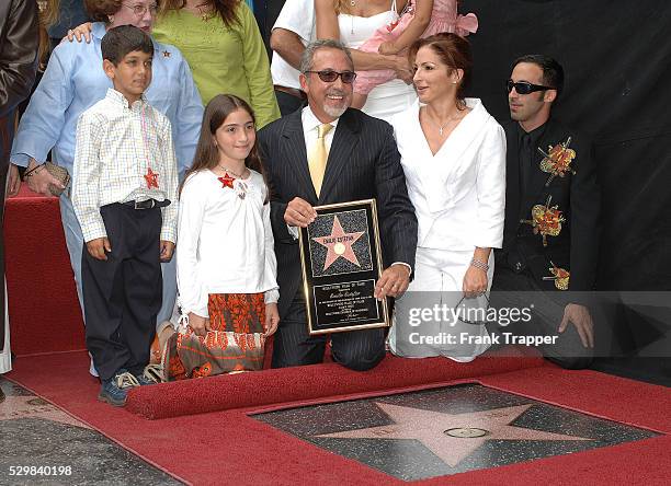 Music producer Emilio Estefan with his new star on the Hollywood Walk of Fame in Los Angeles. Posing with Estefan are his wife singer Gloria Estefan...