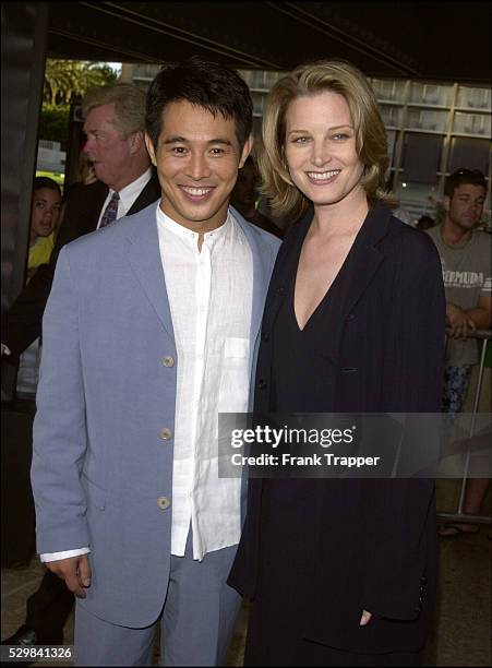 Jet Li and Bridget Fonda arriving at Loews Cineplex Century Plaza Theater.