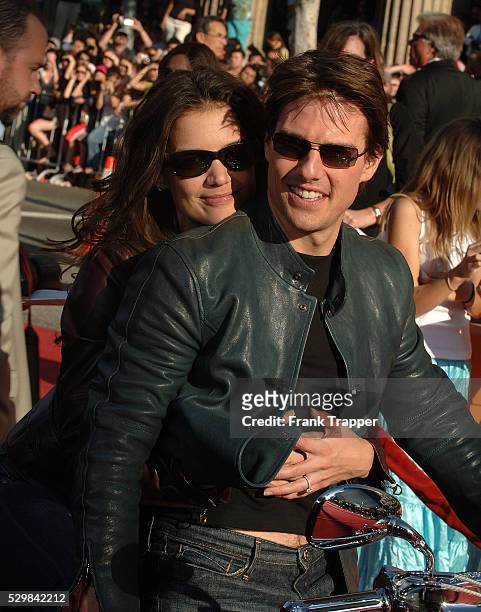 Tom Cruise and Katie Holmes arrive at the special fan premiere of "War of the Worlds," held at the Chinese Theater in Hollywood.