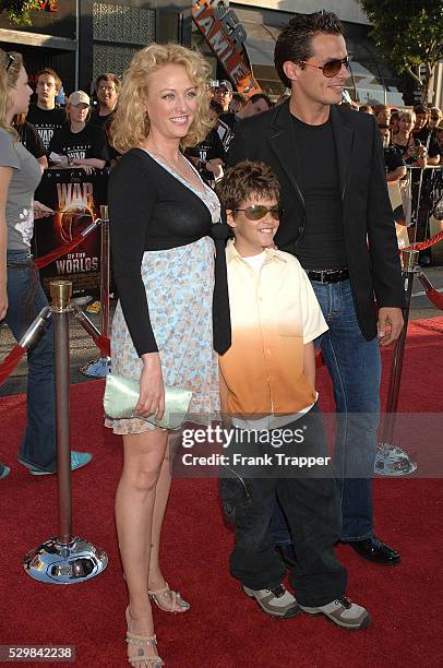 Virginia Madsen and Antonio Sabato Jr. Arrive with their son Jake at the special fan premiere of "War of the Worlds," held at the Chinese Theater in...