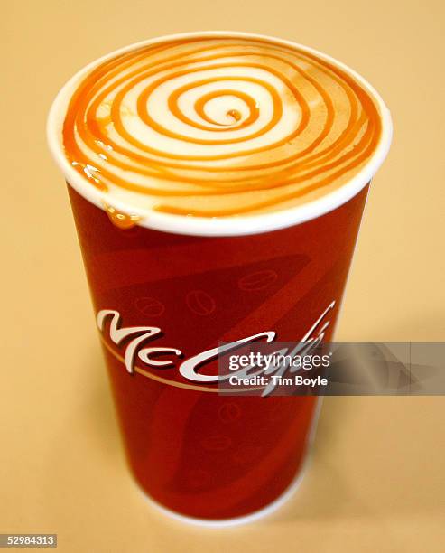 Customer's Hazelnut Caramel Latte sits on a counter at a new McCafe inside a newly constructed McDonald's restaurant May 26, 2005 in Oak Brook,...