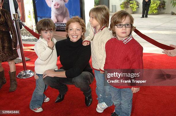 Actress Lauren Holly arrives with sons Aser, George and Henry at the premiere of "Charlotte's Web" held at the ArcLight Cinema in Hollywood.