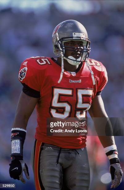Derrick Brooks of the Tampa Bay Buccaneers watches the action during the game against the Tennessee Titans at Adelphia Coliseum in Nashville,...