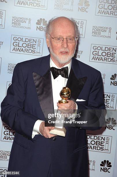 Composer John Williams with his award for Best Original Score - Motion Picture, for the film "Memoirs of a Geisha," at the 63rd annual Golden Globe...