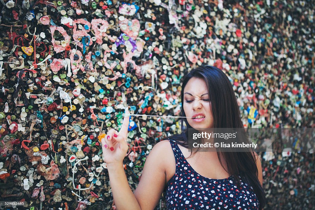 Young Woman Standing In Bubblegum Alley
