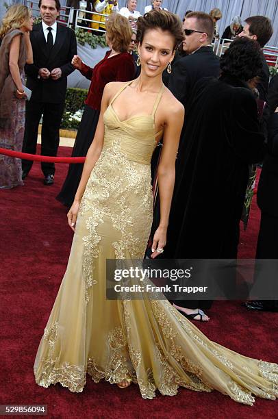 Actress Jessica Alba arrives at the 78th Academy Awards�� held at the Kodak Theatre. Dress by Versace; jewelry by H. Stern; earrings by Erica...