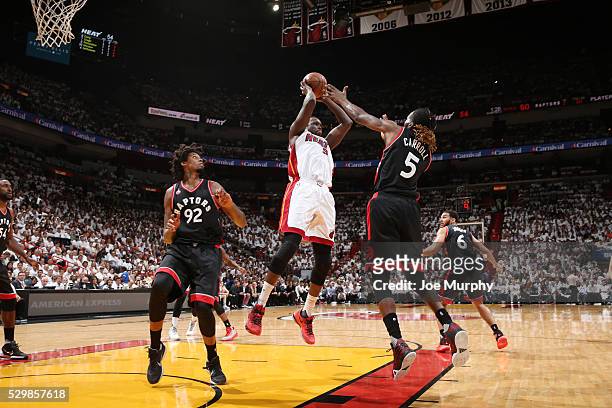 Luol Deng of the Miami Heat looks to pass against the Toronto Raptors in Game Four of the Eastern Conference Semifinals during the 2016 NBA Playoffs...