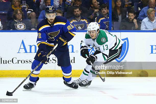 Kevin Shattenkirk of the St. Louis Blues passes the puck against Mattias Janmark of the Dallas Stars in Game Six of the Western Conference Second...