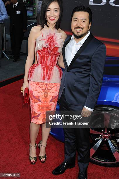 Director-Executive Producer Justin Lin and actress Sarah Li arrive at the premiere of Fast & Furious 6 held at Universal CityWalk and Gibson...