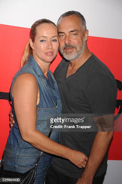 Actor Titus Welliver and wife Jose Stemkens arrive at the premiere of "The Gunman" held at Regal Cinemas L.A. Live.