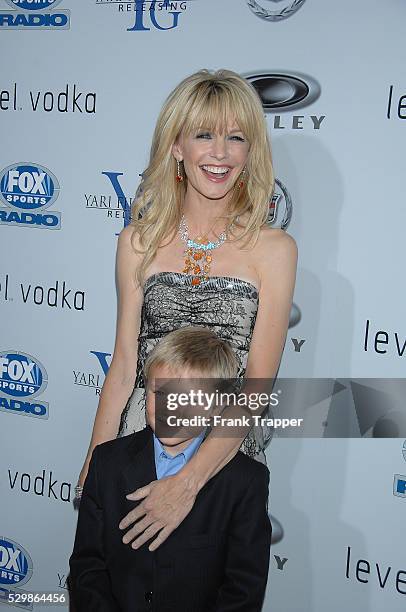 Actress Kathryn Morris and actor Dakota Goyo arrive at the premiere of "Resurrecting The Champ" held at the Academy of Motion Picture Arts & Sciences...
