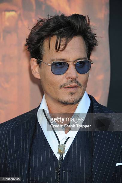 Actor Johnny Depp arrives at the premiere of The Lone Ranger held at Disney California Adventure Park in Anaheim, California