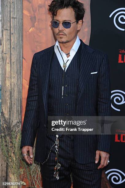 Actor Johnny Depp arrives at the premiere of The Lone Ranger held at Disney California Adventure Park in Anaheim, California