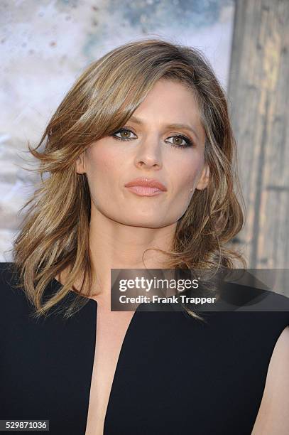 Actress Stana Katic arrives at the premiere of The Lone Ranger held at Disney California Adventure Park in Anaheim, California