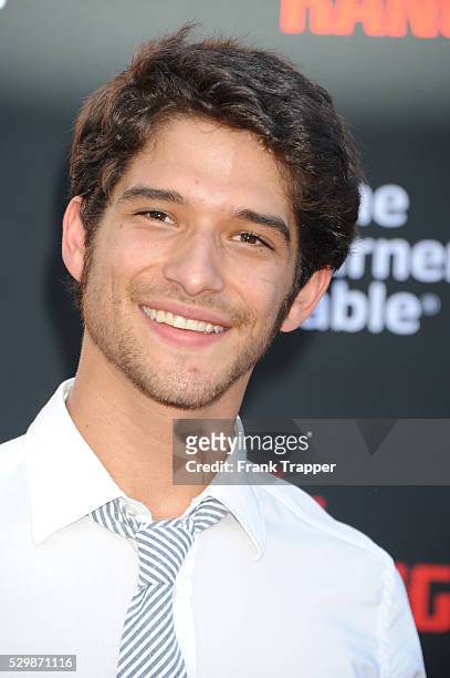 Actor Tyler Posey arrives at the premiere of The Lone Ranger held at Disney California Adventure Park in Anaheim, California