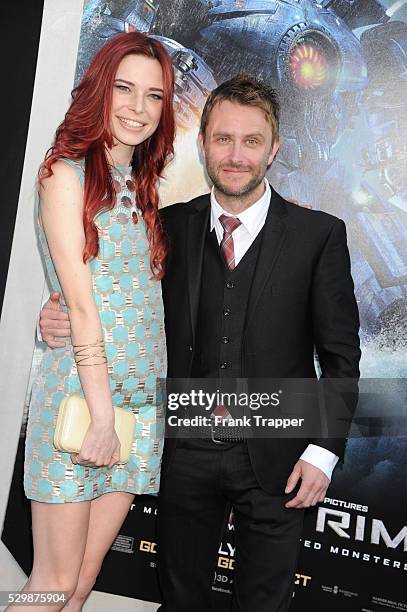 Actors Chris Hardwick and Chloe Dykstra arrive at the premiere of Pacific Rim held at the Dolby Theater in Hollywood.