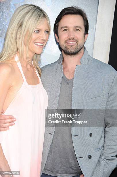 Actress Kaitlin Olson and actor Rob McElhenney arrive at the premiere of Pacific Rim held at the Dolby Theater in Hollywood.