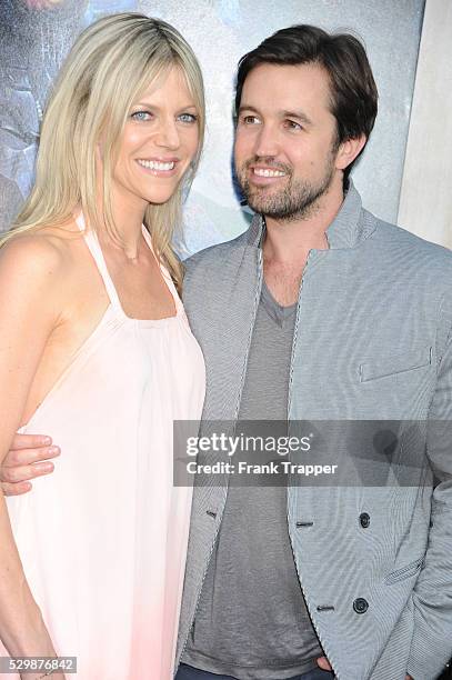 Actress Kaitlin Olson and actor Rob McElhenney arrive at the premiere of Pacific Rim held at the Dolby Theater in Hollywood.