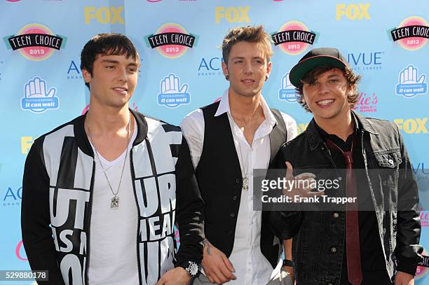 Singers Emblem 3 arrive at the Teen Choice Awards 2013 held at Universal Studios, Gibson Amphitheatre.