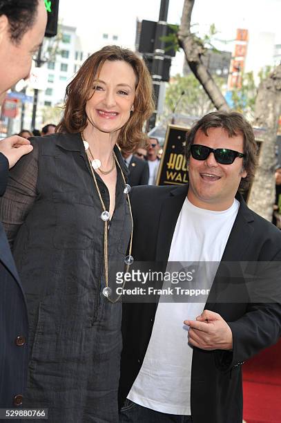 Actors Joan Cusack and Jack Black pose at Star ceremony honoring John Cusack on the Hollywood Walk of Fame.