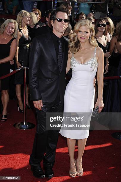 Actor and musician Kevin Bacon and wife actress Kyra Sedgwick arrives at the 60th Primetime Emmy�� Awards held at the Nokia Theatre. Dress by L'Wren...