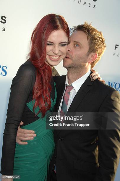 Actress Chloe Dykstra and comedian Chris Hardwick arrive at the premiere of The World's End held at the Cinerama Dome, Hollywood.