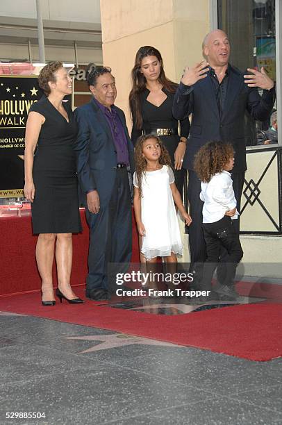 Actor Vin Diesel and family pose at the ceremony that honored him with a Star on the Hollywood Walk of Fame.