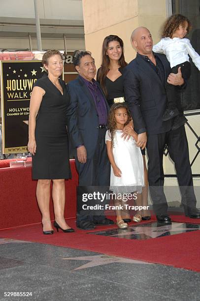 Actor Vin Diesel and family pose at the ceremony that honored him with a Star on the Hollywood Walk of Fame.