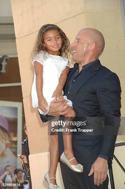 Actor Vin Diesel and daughter pose at the ceremony that honored him with a Star on the Hollywood Walk of Fame.