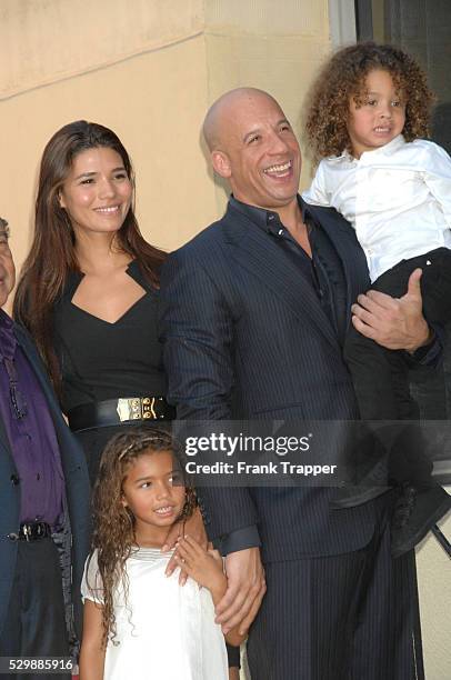 Actor Vin Diesel pose with his wife and children at the ceremony that honored him with a Star on the Hollywood Walk of Fame.