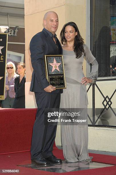 Actor Vin Diesel and actress Michelle Rodriguez pose at the ceremony that honored him with a Star on the Hollywood Walk of Fame.