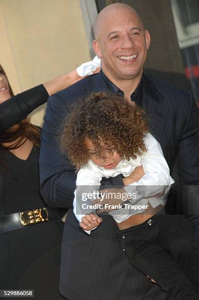 Actor Vin Diesel pose with his wife and children at the ceremony that honored him with a Star on the Hollywood Walk of Fame.