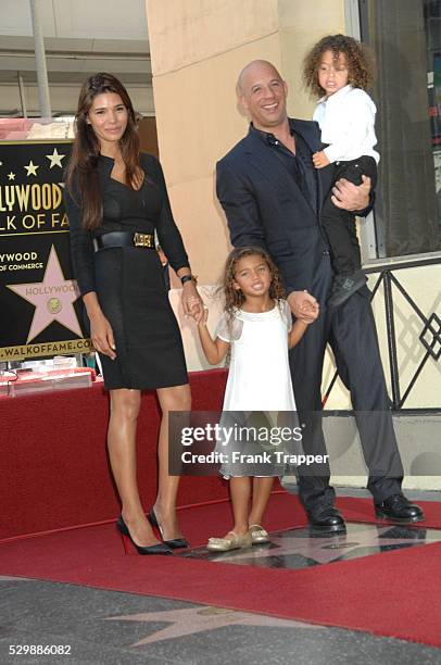 Actor Vin Diesel pose with his wife and children at the ceremony that honored him with a Star on the Hollywood Walk of Fame.