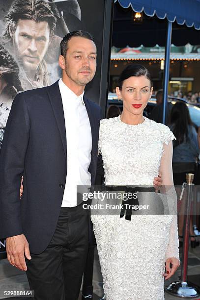 Actress Liberty Ross director Rupert Sanders arrive at the special screening of Snow White and The Huntsman held at Mann Village Theater in Westwood.