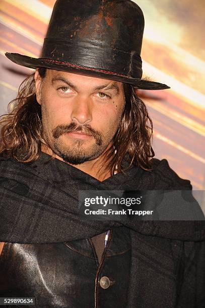 Actor Jason Momoa arrives at the premiere of "Mad Max: Fury Road" held at the TCL Chinese Theater in Hollywood.