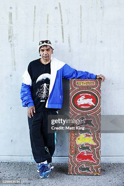 South Sydney Rabbitohs supporter Craig Davis poses with a piece of his own artwork speaks to the media during a South Sydney Rabbitohs media session...