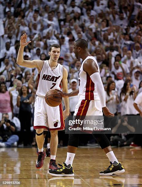 Dwyane Wade and Goran Dragic of the Miami Heat celebrates winning Game 4 of the Eastern Conference Semifinals of the 2016 NBA Playoffs against the...