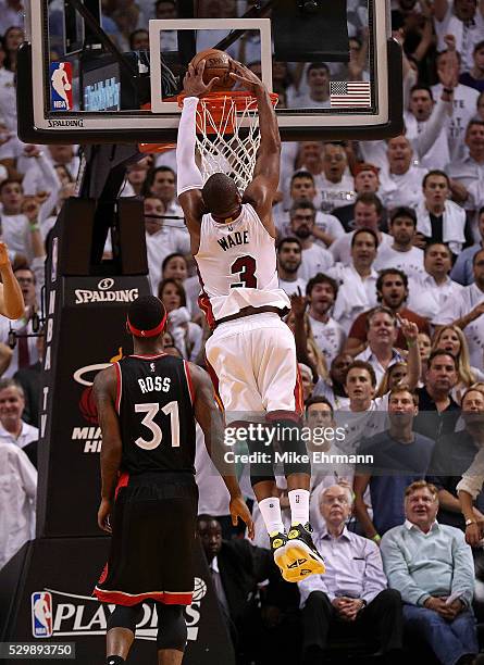 Dwyane Wade of the Miami Heat dunks in overtime during Game 4 of the Eastern Conference Semifinals of the 2016 NBA Playoffs against the Miami Heat at...